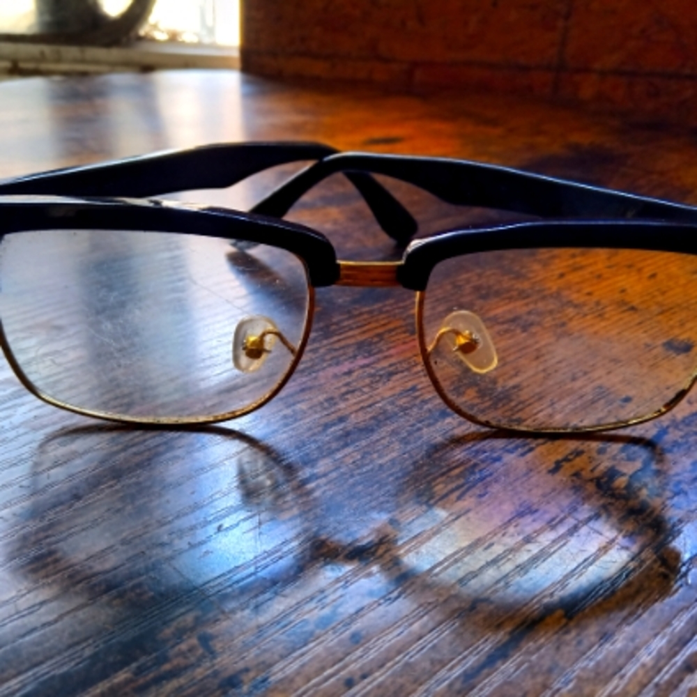 black and gold frame eyeglasses